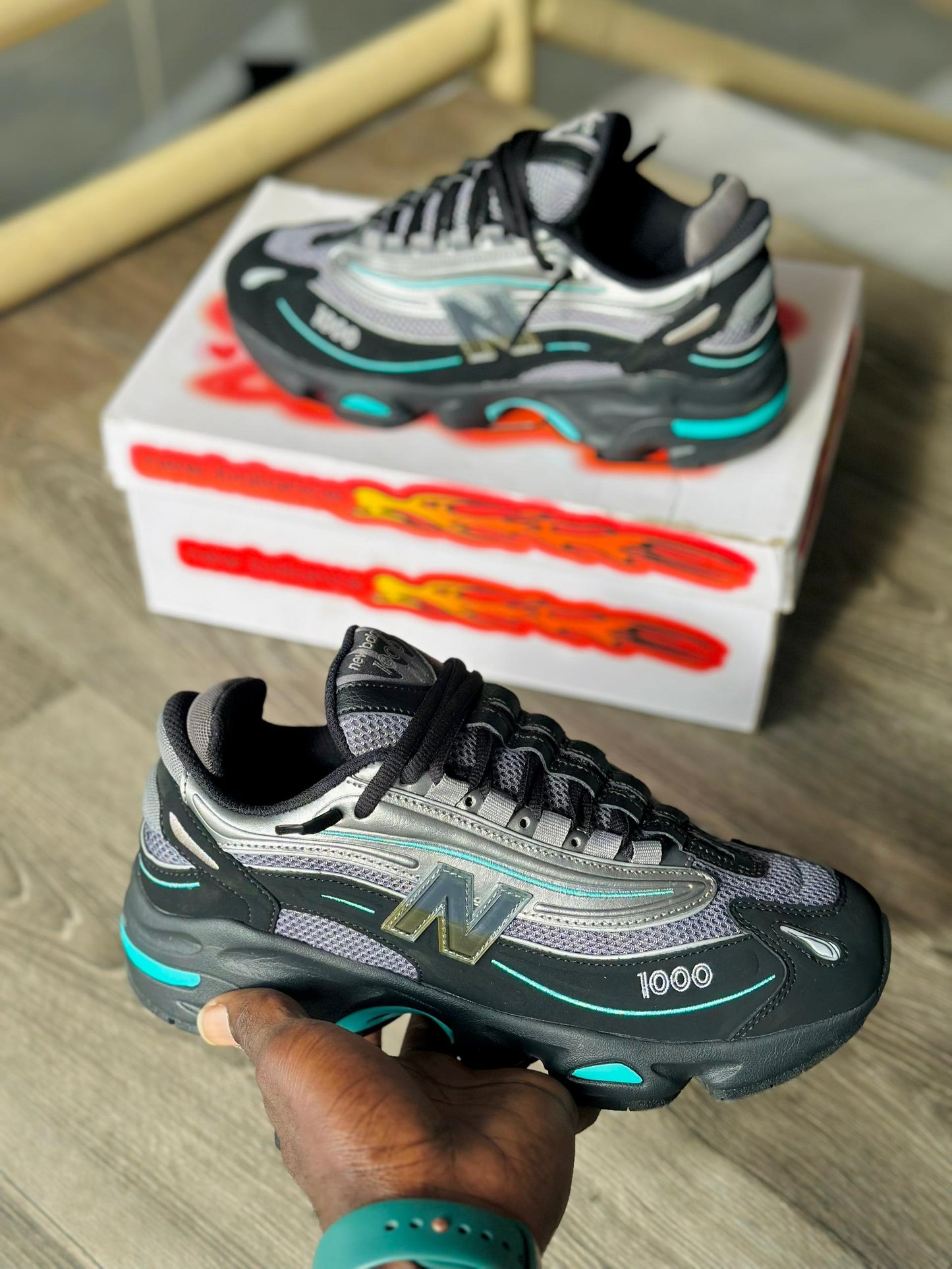 baskets New Balance 1000 'Black Teal' (ou 'Noir Sarcelle').