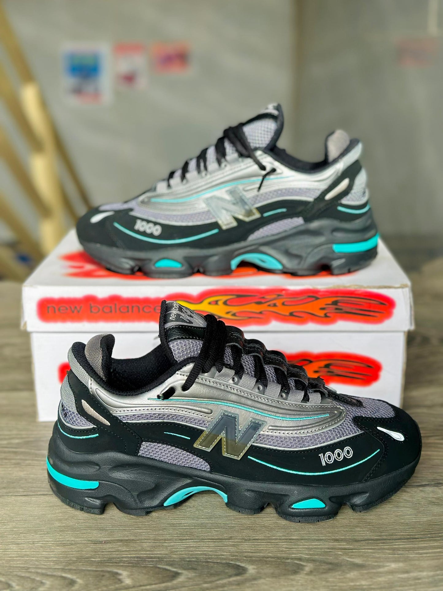 baskets New Balance 1000 'Black Teal' (ou 'Noir Sarcelle').