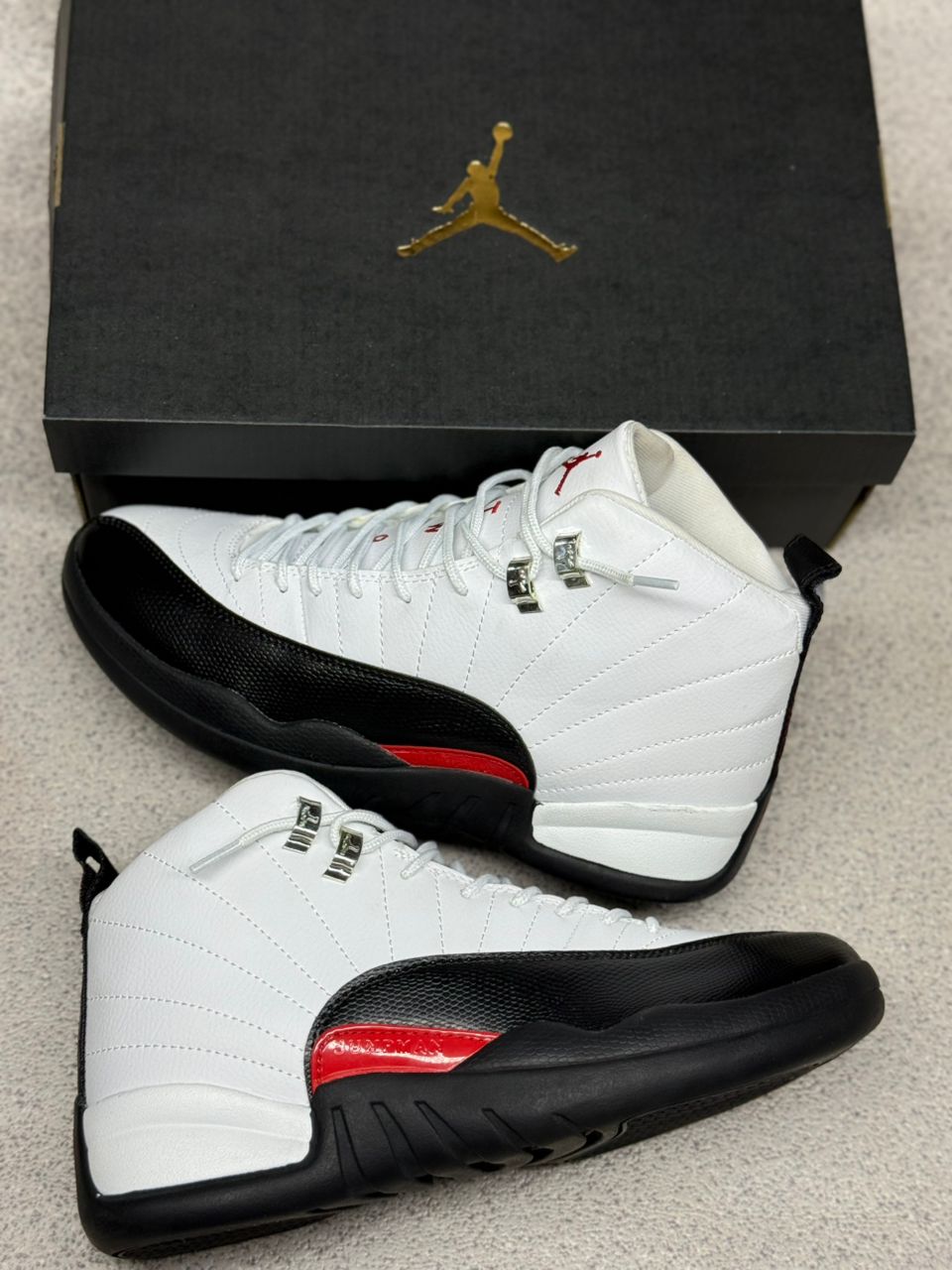 Nike Air Jordan 12 Retro Taxi Flip.