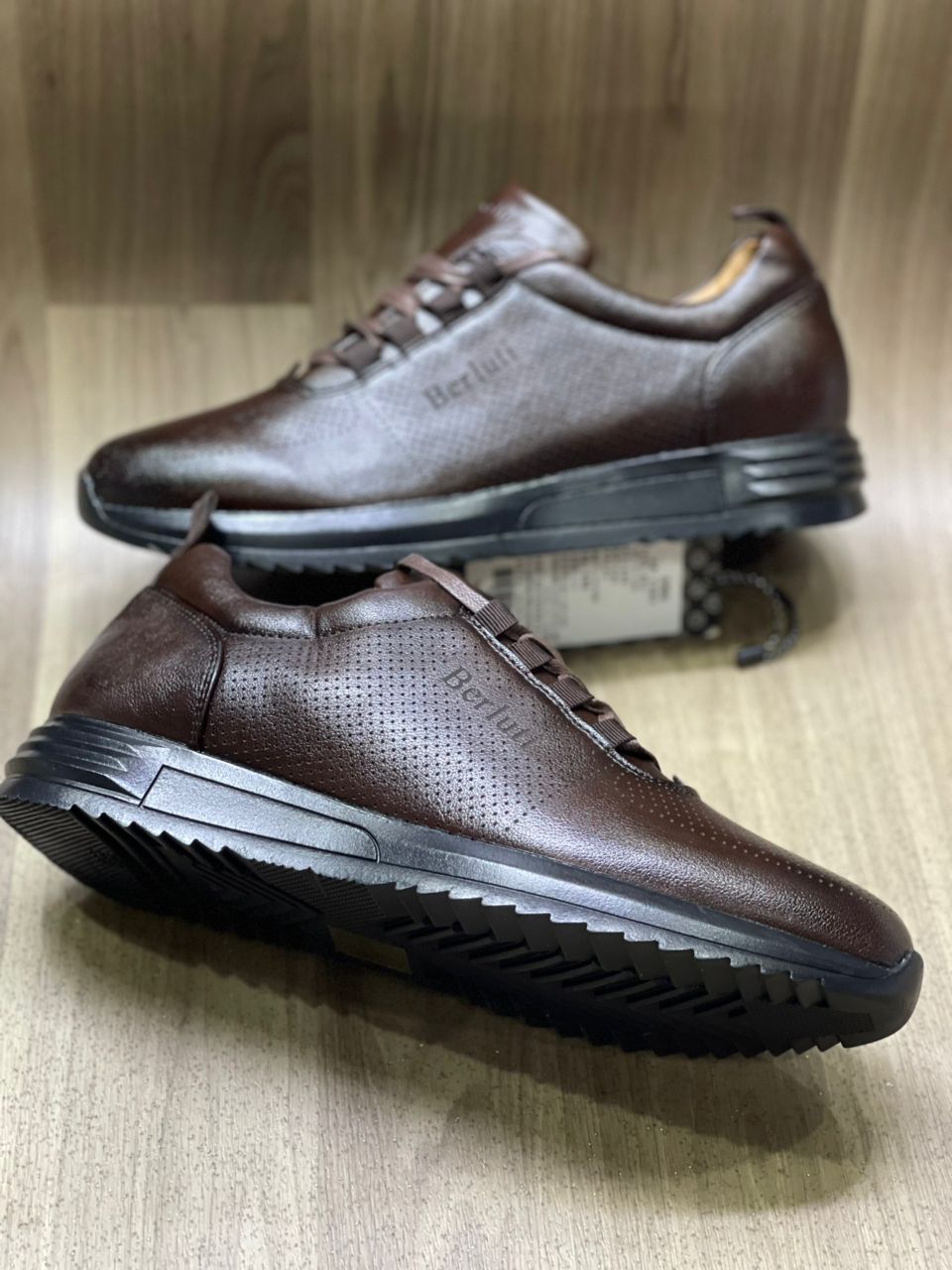 Berluti.